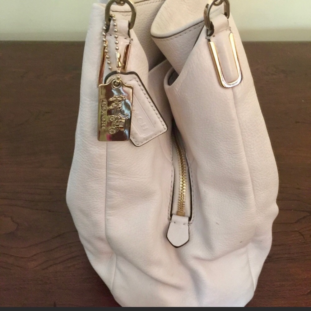 leather pebble shoulder bag in cream color